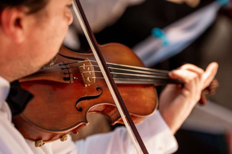 Close up of violin player