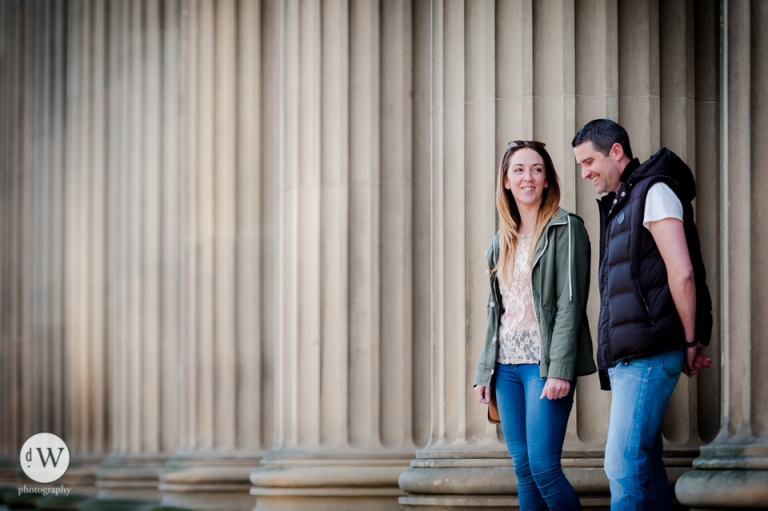 Couple smiling together in front of St Georges hall