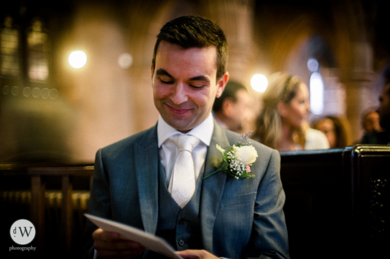 Groom reads a note from his bride