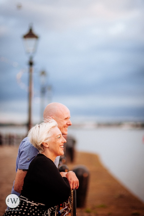 Couple looking out over the river Mersey