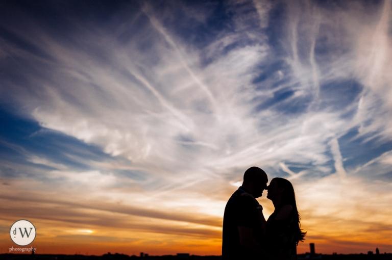 Silhouette of couple with sunset sky