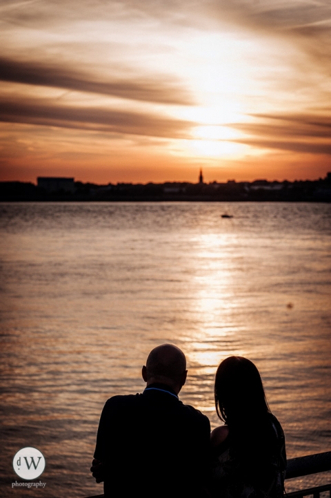 Couple silhouette looking out the Mersey