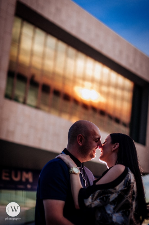 Couple kissing outside Liverpool Museum