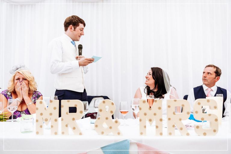 Groom tells his bride how much he loves her during his speech