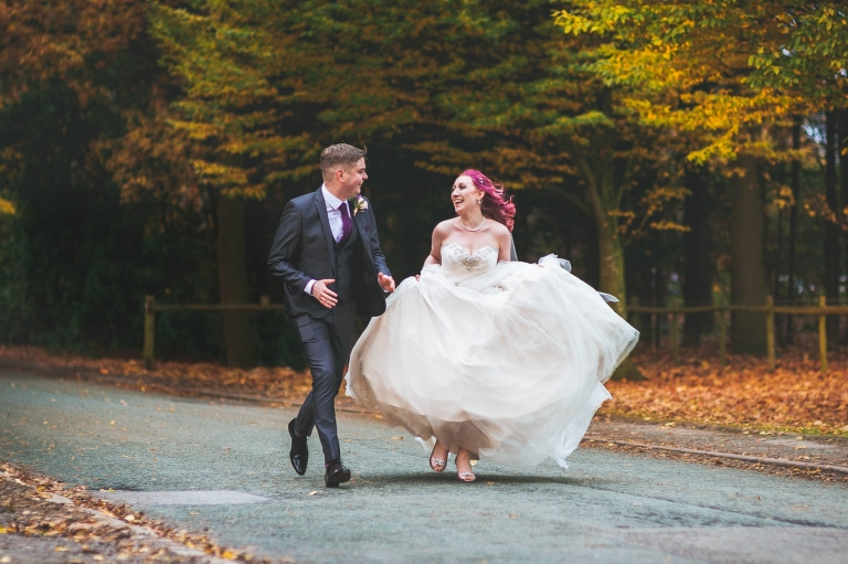 Bride and groom run together