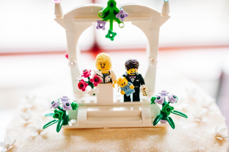 Lego figures on top of wedding cake
