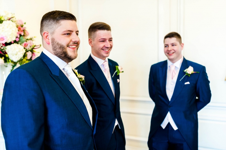 groom and ushers share a joke