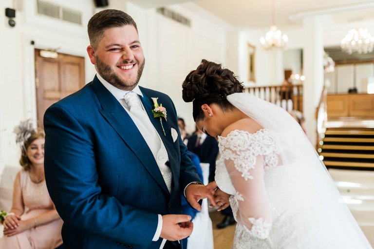 bride and groom share a joke