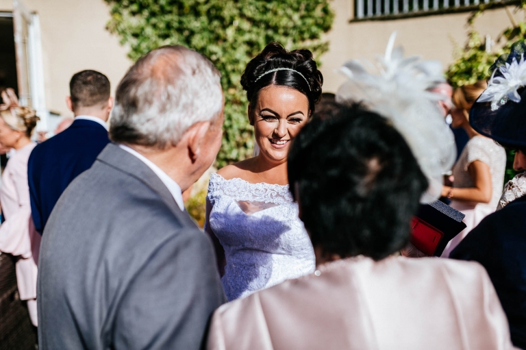 guests congratulate bride