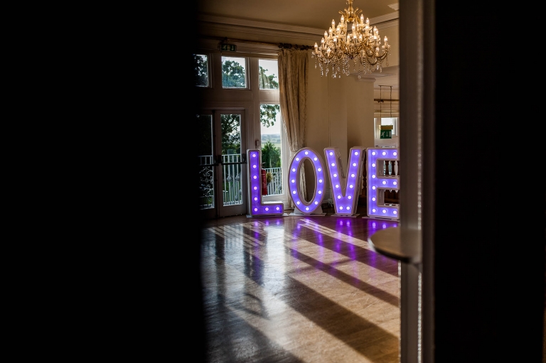 Love sign in wedding breakfast room