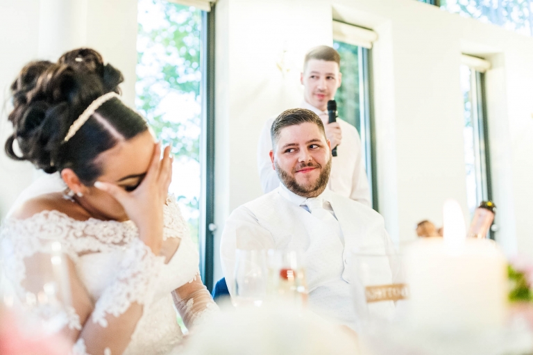 bride laughs at best man's speech