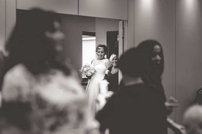 bride waiting to walk up ails