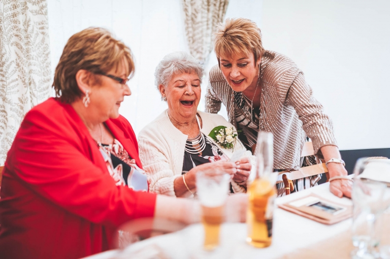 Nan share a joke with mother of the bride