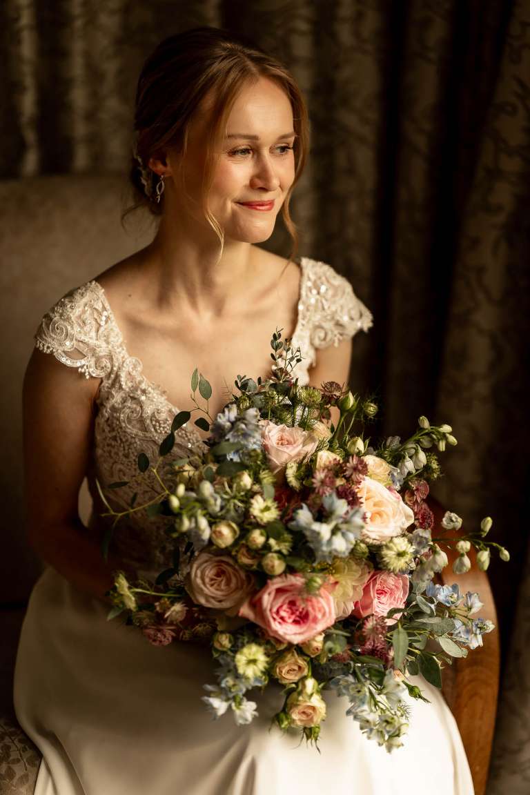 Bride portrait with her wedding bouquet