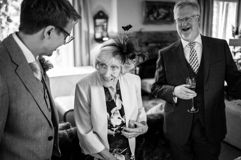 groom shares a joke with his gran