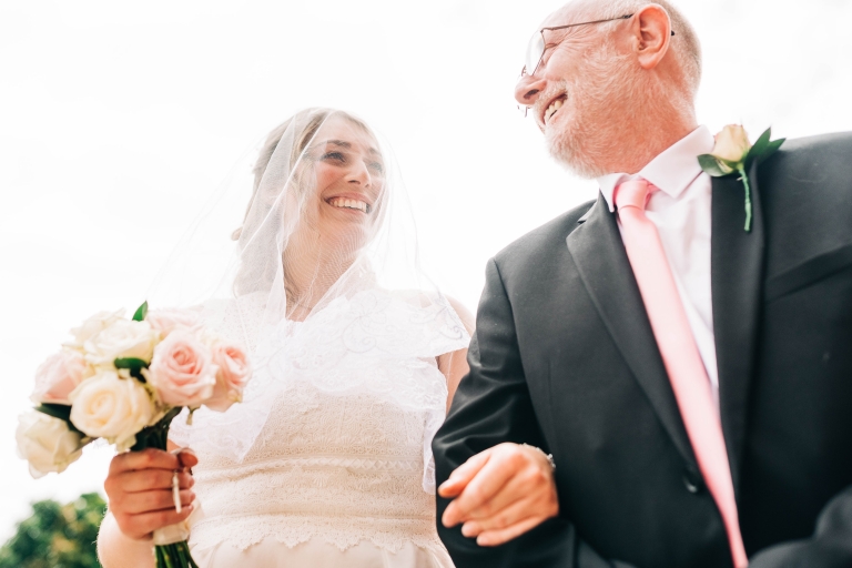 Bride gets shares a joke with her father