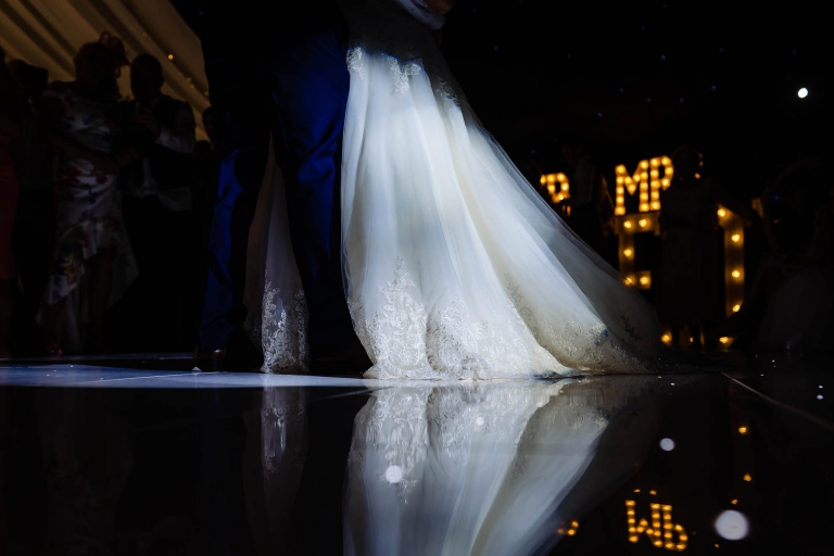 Brides dress reflected on floor