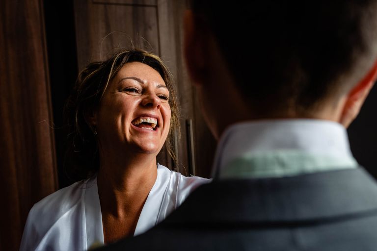 Bride shares a joke with her son