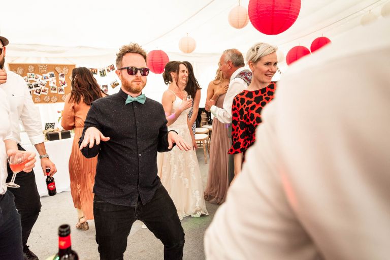 wedding guest being silly on the dancefloor