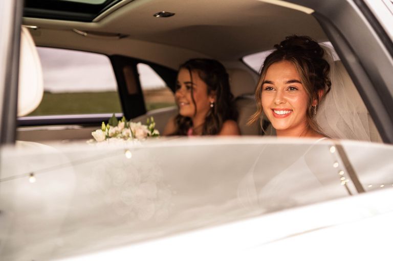 Bride arrives in Wedding car