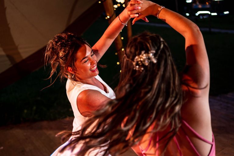 Bride dances with sister