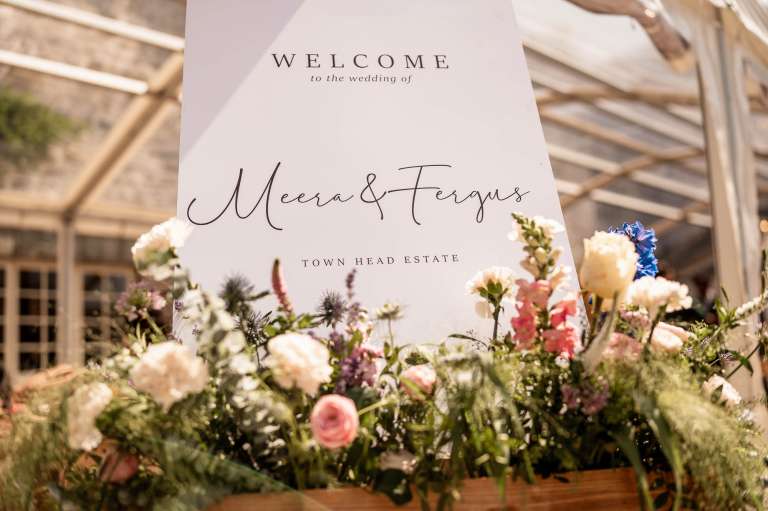 Welcome to the wedding sign and wedding flowers