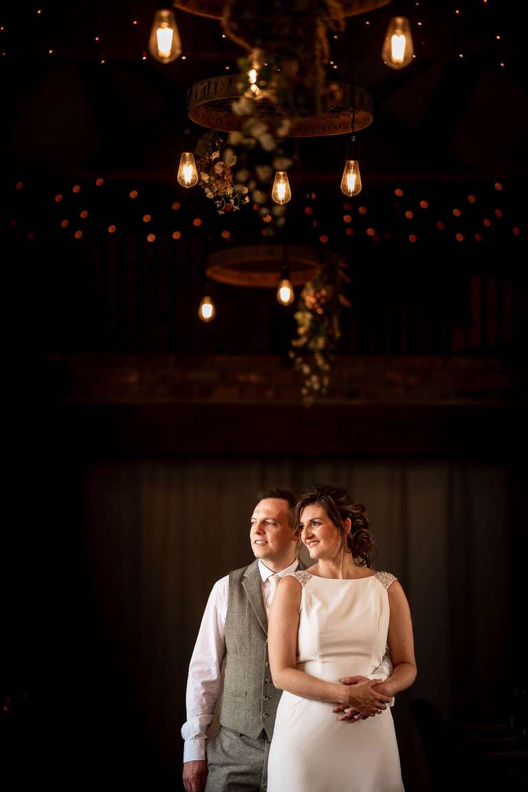 Close up of bride and groom portrait in the Barn