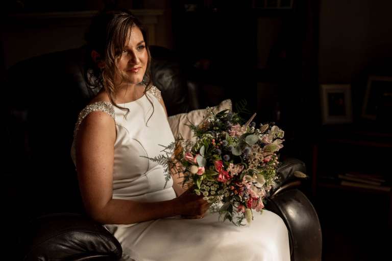 Bridal portrait with her bridal bouquet